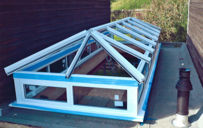Fit the roof to the upstands